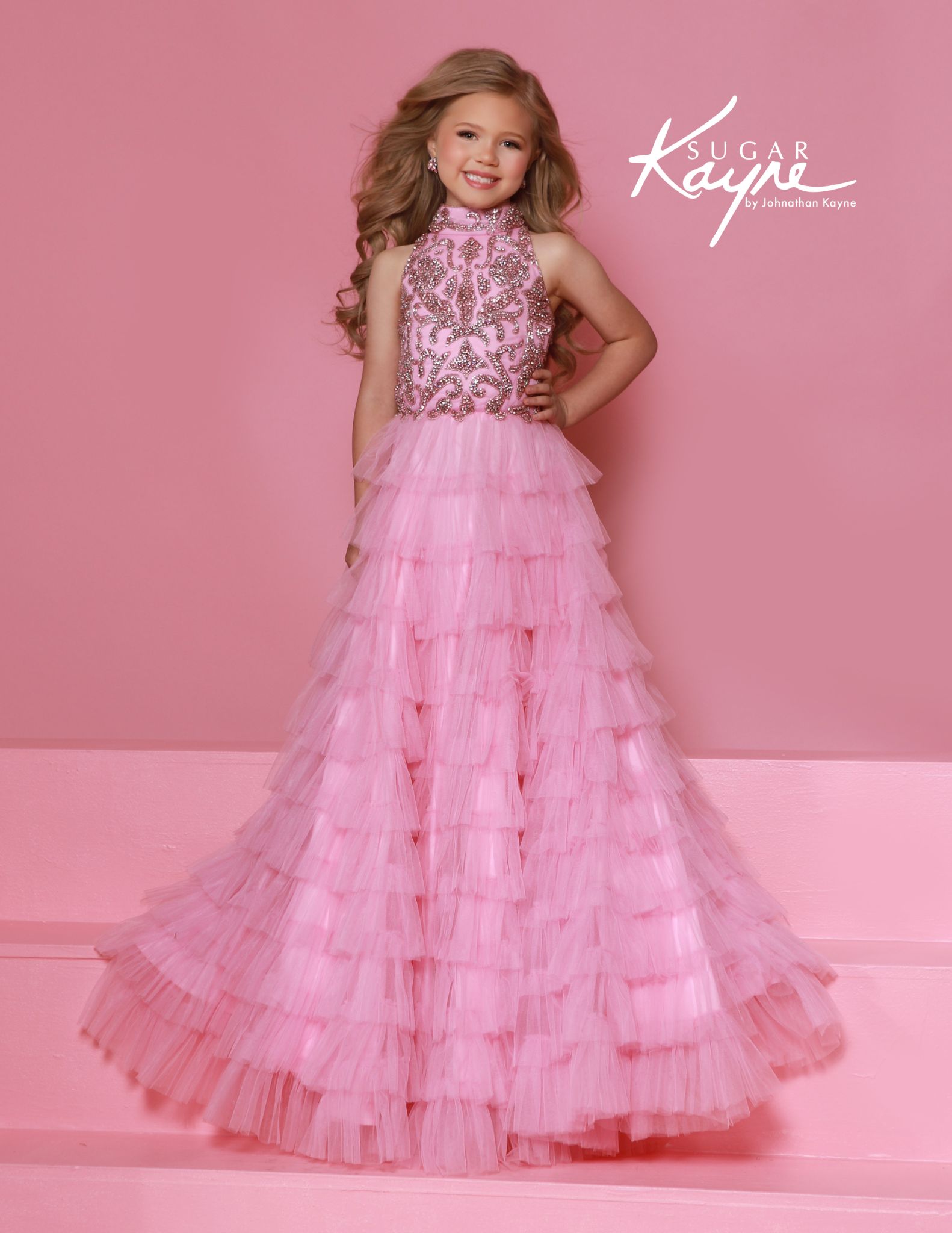 Pink high-neck ruffle pageant dresses with rhinestone-embellished bodice and layered skirt, ideal for children's beauty pageants.